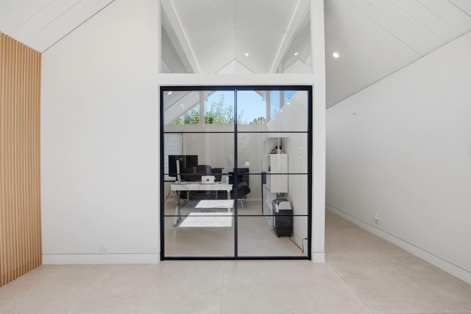 Italian glass pivot door to home office